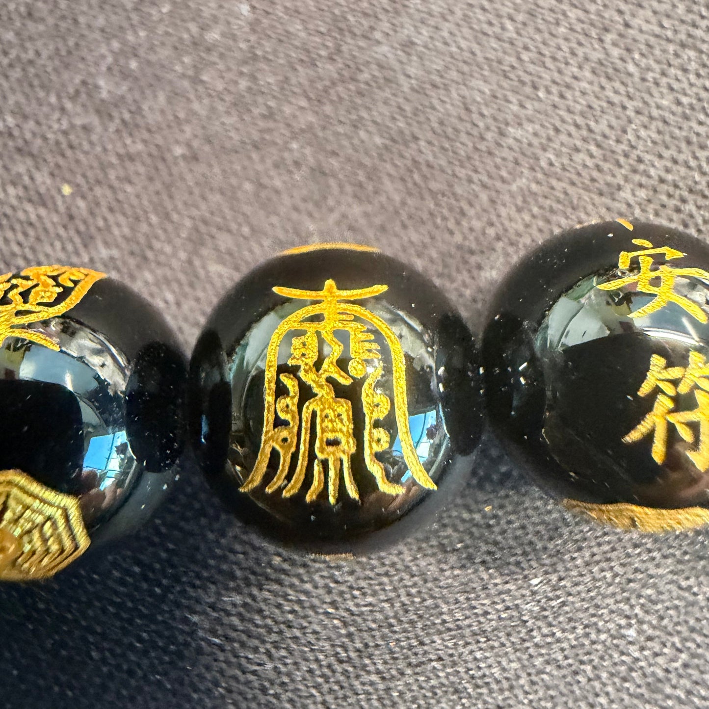 Gold Protection Symbols on Black Agate 10mm Smooth Round Bead - 7.25" Strand (GEM2459)