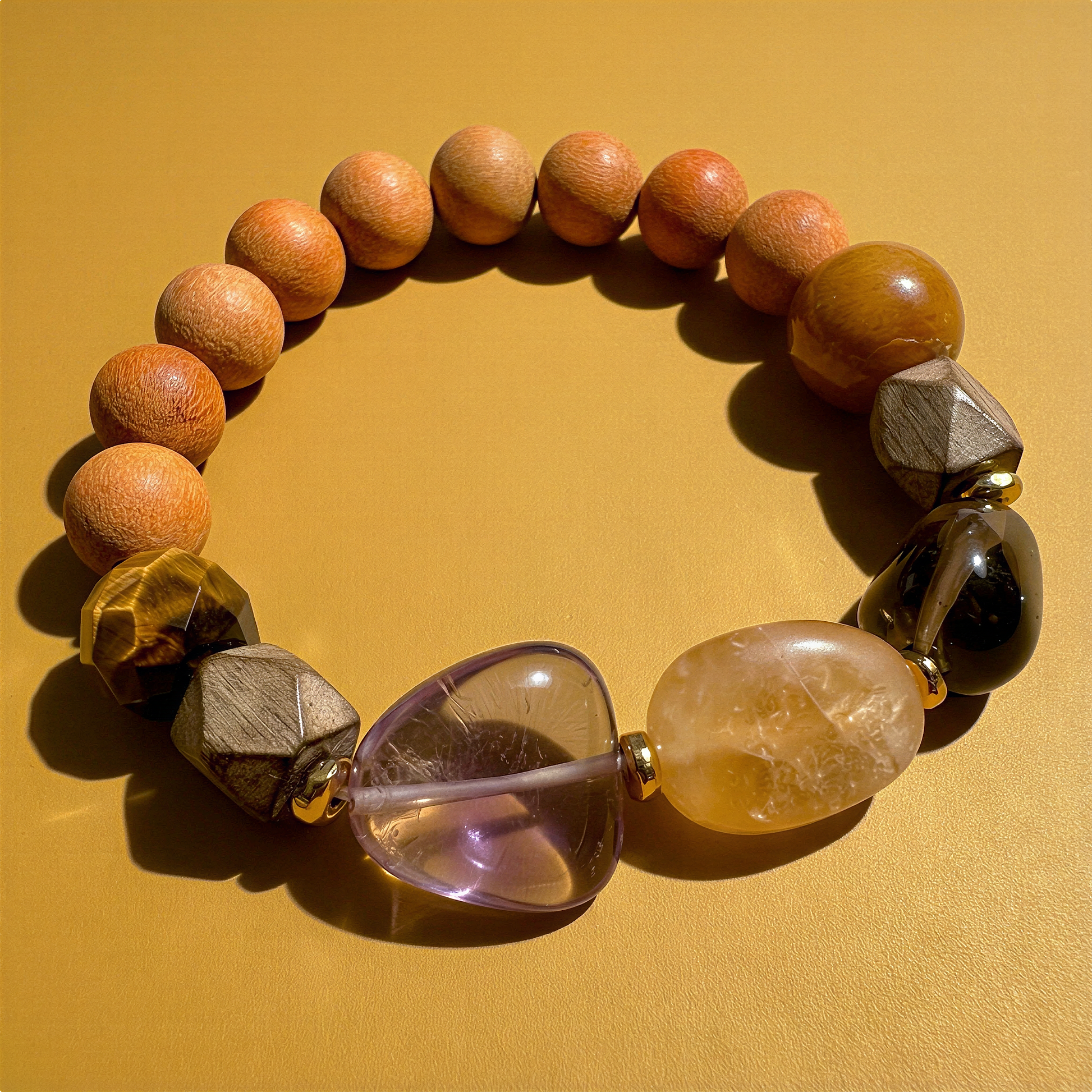 Vibrant focal gemstone bead mix displayed on bold, saturated color backdrop for striking, modern visual impact