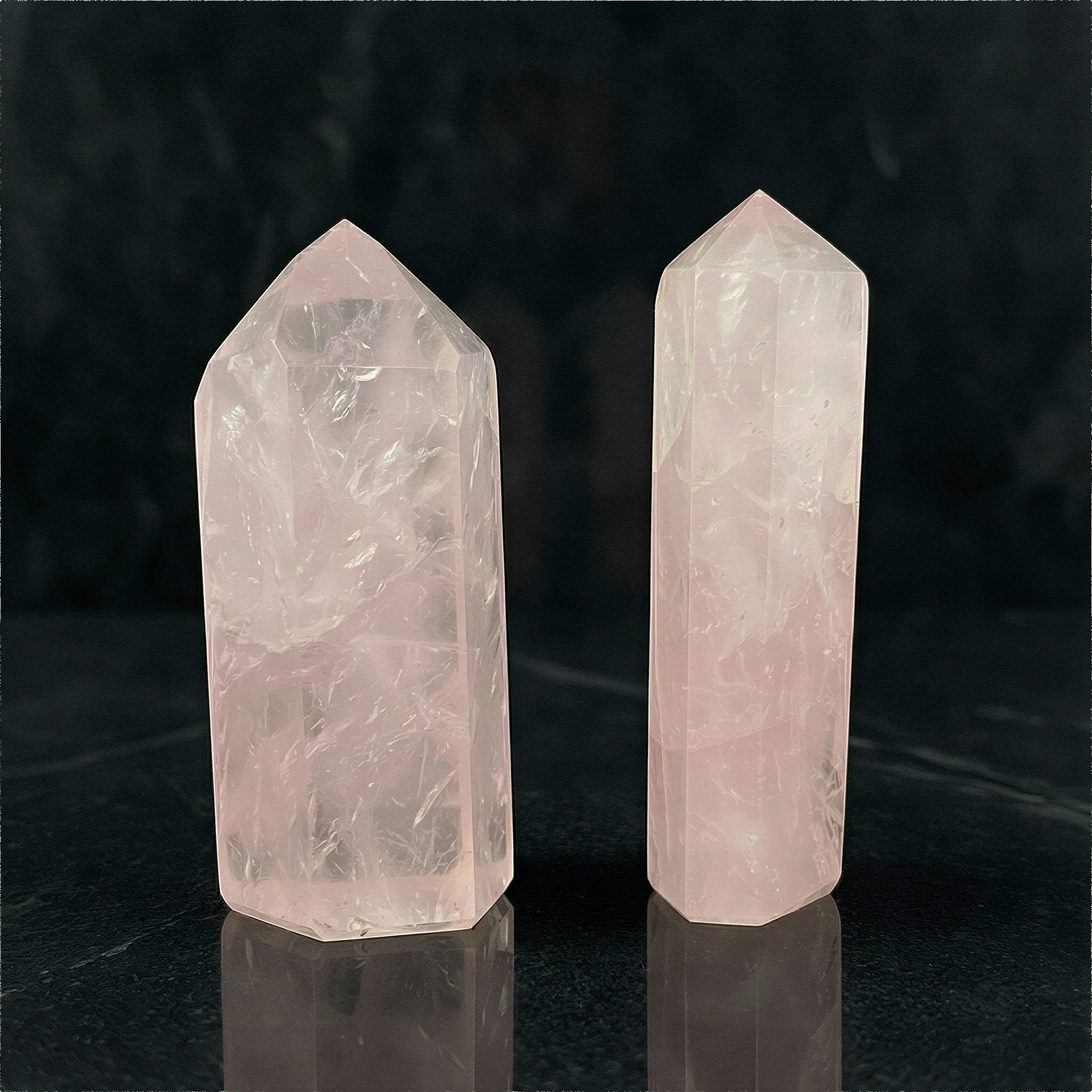 Mini rose quartz point on neutral backdrop with soft studio light, enhanced clarity and gentle blush tones