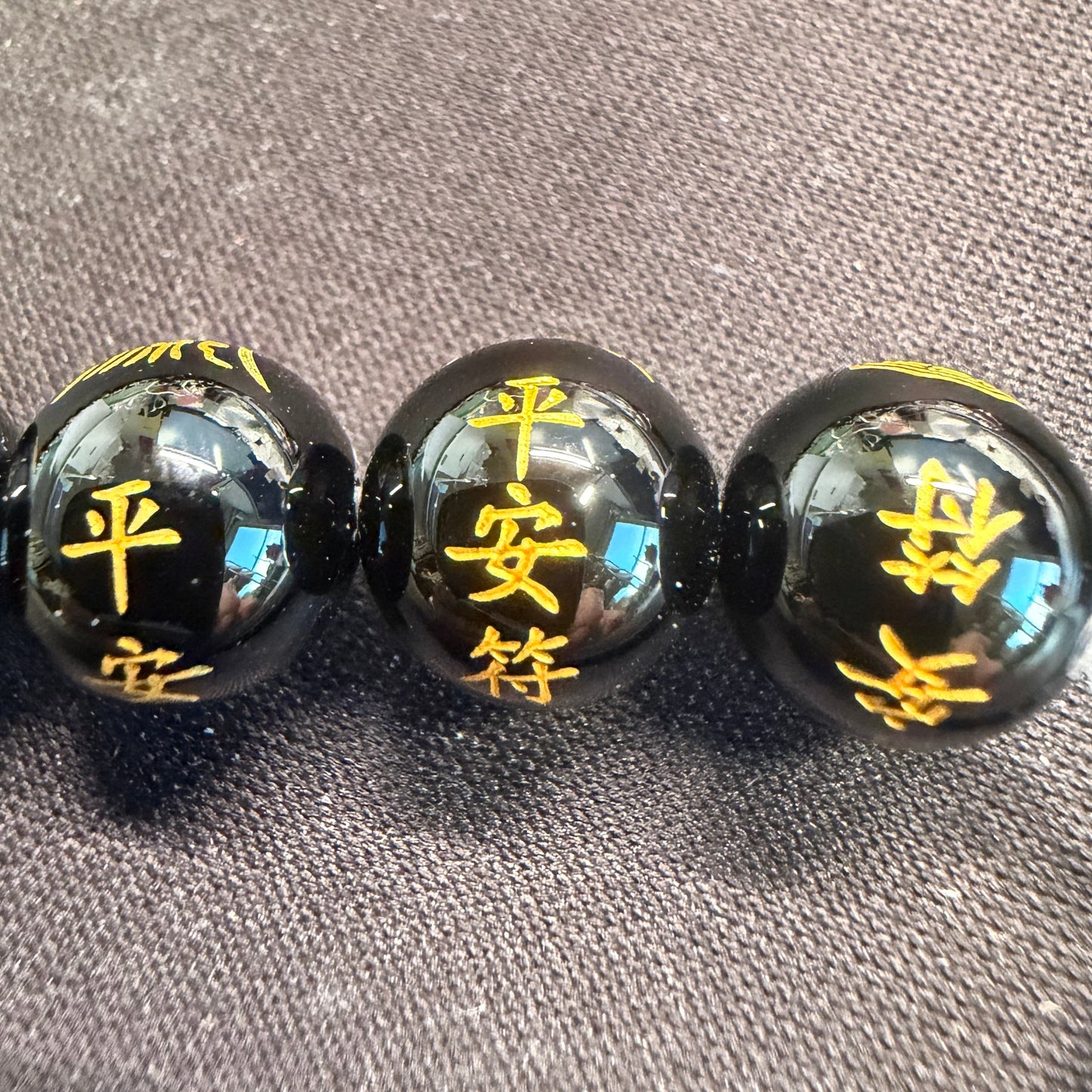 Gold Protection Symbols on Black Agate 10mm Smooth Round Bead - 7.25" Strand (GEM2459)