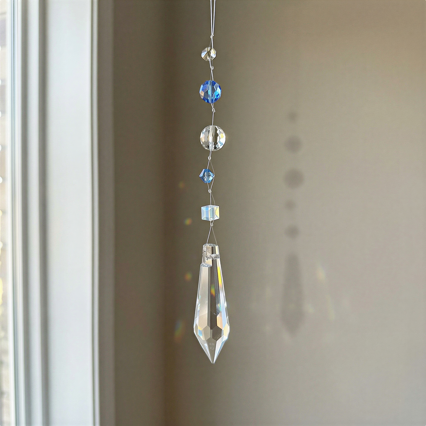 Sparkling crystal holiday ornament lightcatcher kit styled with refined clarity, enhanced color, and softly illuminated festive setting