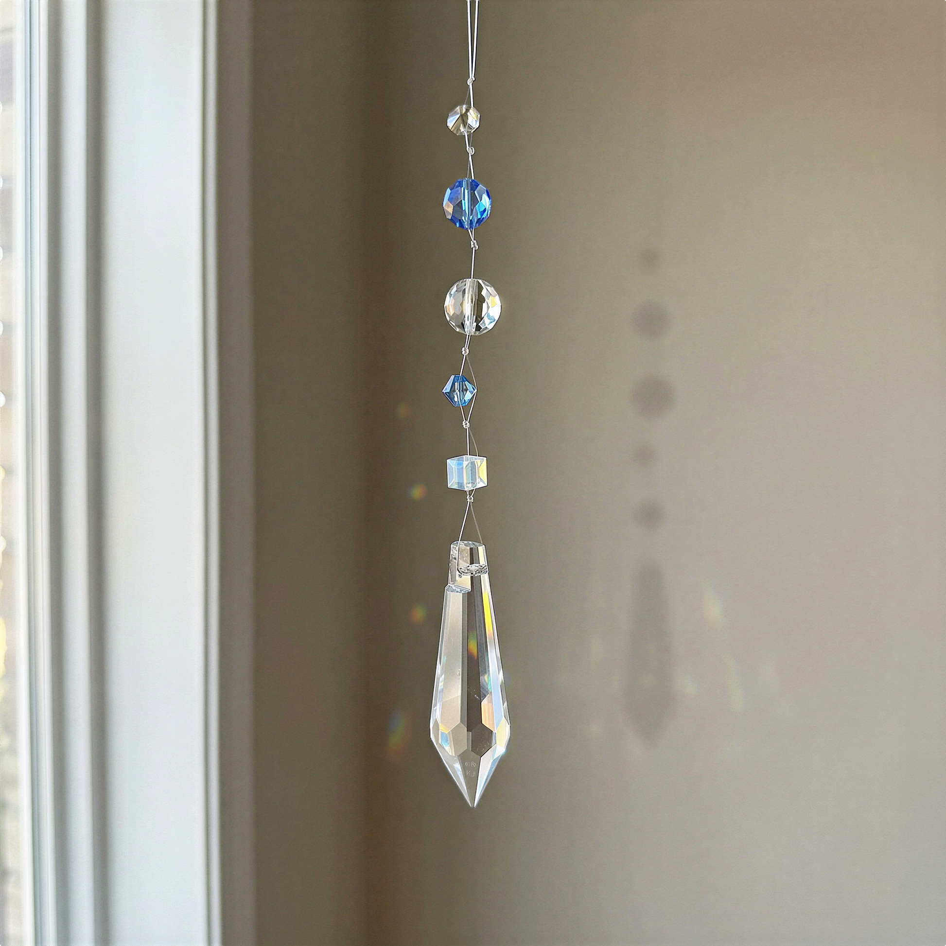 Sparkling crystal holiday ornament lightcatcher kit styled with refined clarity, enhanced color, and softly illuminated festive setting