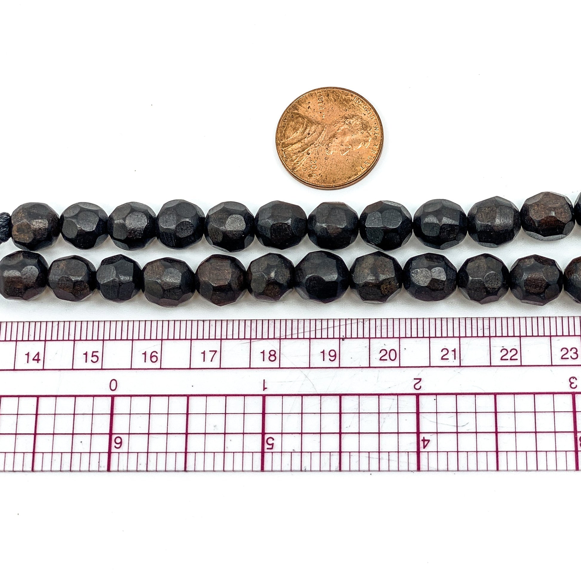 Faceted Ebony Wood Strand - 8mm Round