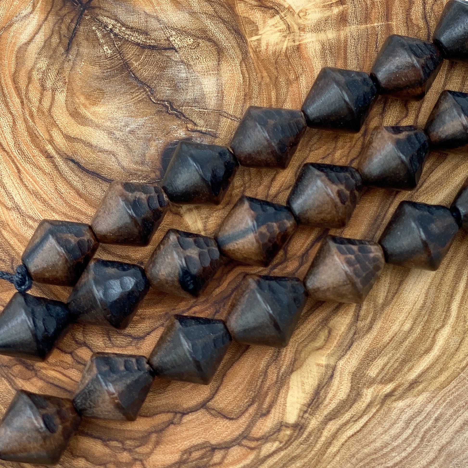 Faceted Tiger Ebony Wood Strand - 14mm Bicone