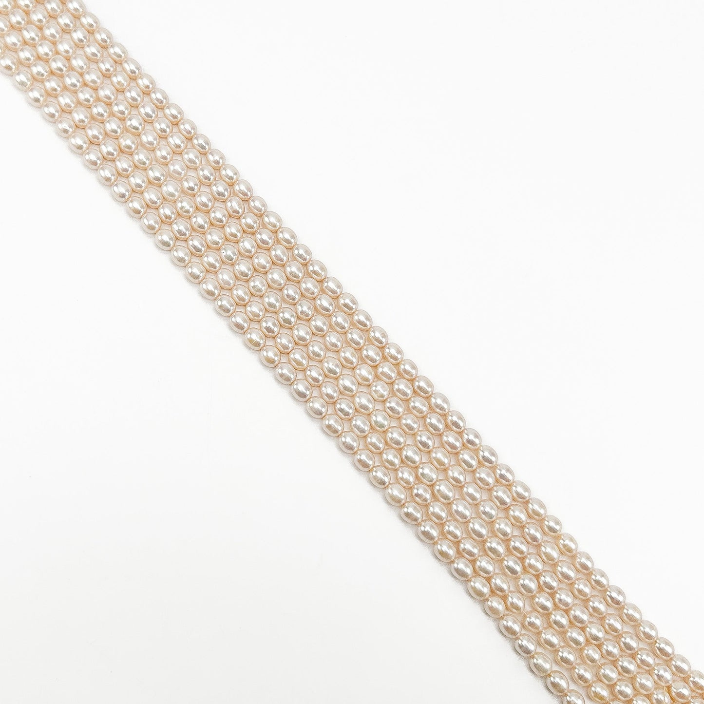 Freshwater Pearl 6.5mm Light Champagne Potato Bead - 8" Strand (GEM2208)