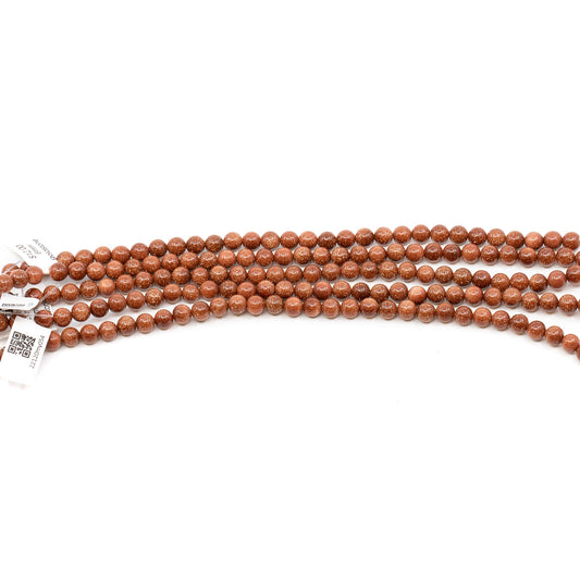 Goldstone 6mm Smooth Round Bead - 8" Strand