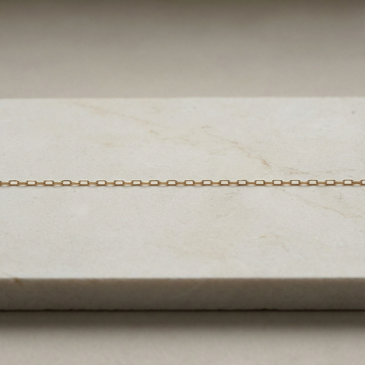 Delicate light drawn cable chain in sterling silver and gold fill styled in serene, balanced luxury setting