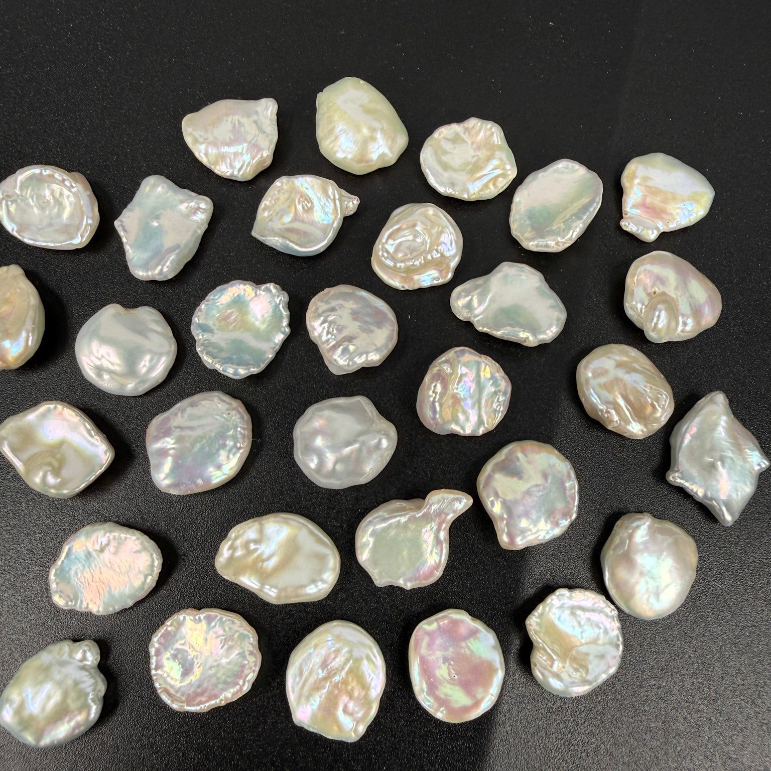 Collection of natural pearls on a dark background