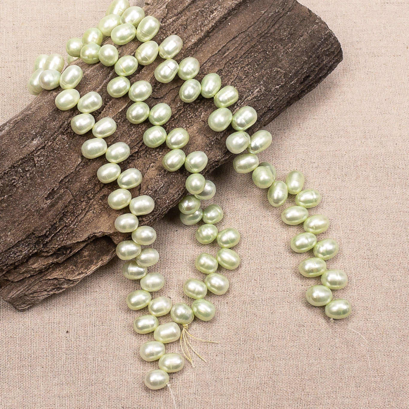 Freshwater Pearl Green Rice Tip-Drill Bead - 7.5" Strand