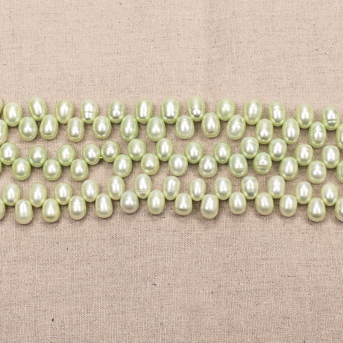 Freshwater Pearl Green Rice Tip-Drill Bead - 7.5" Strand
