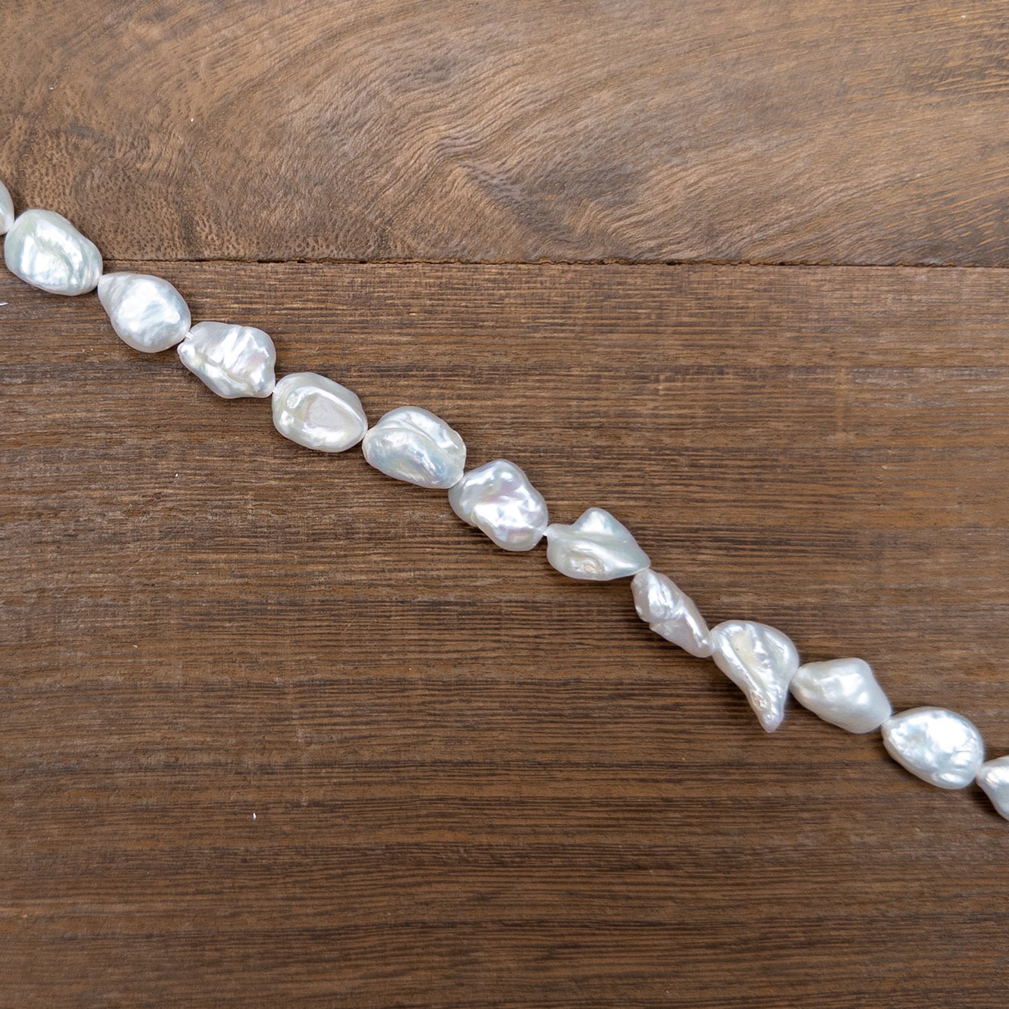 Natural White 12x10mm Long-Drilled Biwa Freshwater Pearl Bead - 7.25" Strand